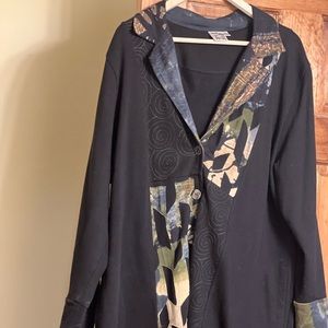 Beautiful jacket over shirt.   Multi colored and soothing patterns.